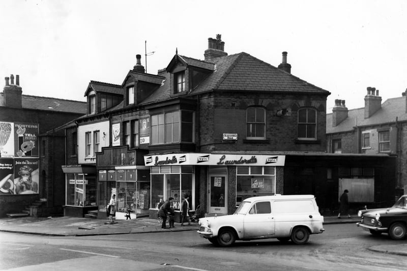  Number 39 Hyde Park Road is to the left, County Cleaners. Next right, 41 has travel information in the windows. The Spic Launderette is number 43, at the corner with Alexandra Road, which is on the right. Pictured in January 1968.