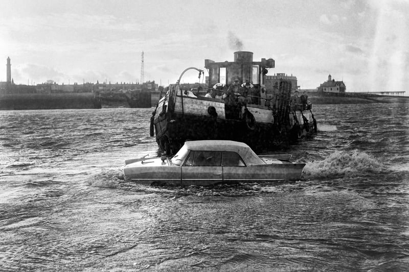 Car goes adrift in Fleetwood.
American designed, combined car and boat, the Amphicar, in it's first North of England sea trials off Knott End in 1964