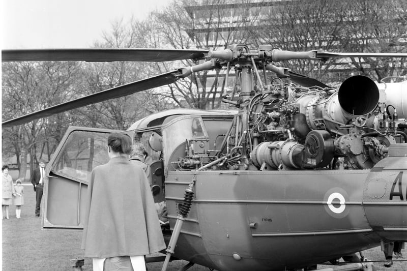 A nurse stands by to receive her patient from an RAF helicopter which landed in the Meadows Edinburgh, with an injured soldier in April 1969.