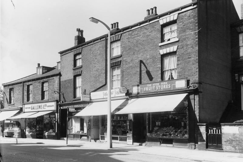  A row of commercial properties on Woodhouse Street. Numbers run from 230 to 222, left to right. Shops include Gallons Ltd, grocers at number 228 and the Hyde Park Fruit Stores at number 222. Pictured in August 1961. 