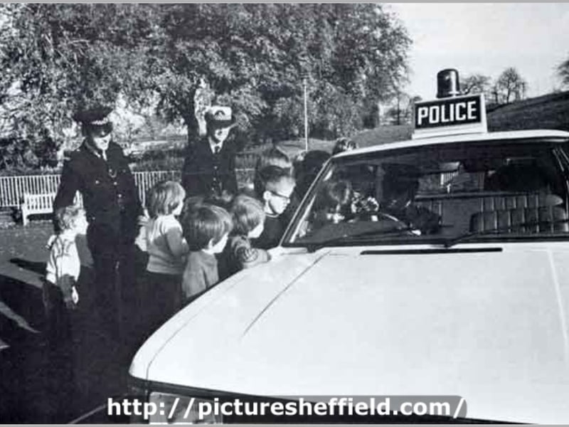 South Yorkshire Police: Young children take a close look at a Force patrol vehicle in Sheffield in 1979., Photo: Picture Sheffield