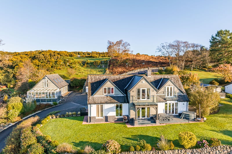 The property is priced at offers over £975,000 and is marketed by Fine and Country South Scotland.