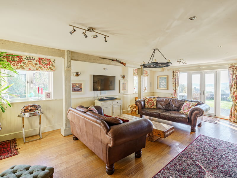 The vistas can be admired from inside the living room which has double doors opening directly to the garden.
