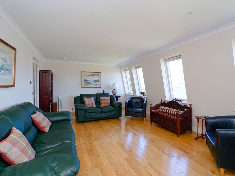 There is a first-floor family room with windows to encapsulate the views of the loch and the hills beyond.