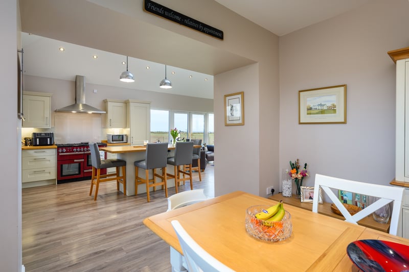 A new kitchen extension has been added and includes a Rangemaker cooker and a generously sized island unit.