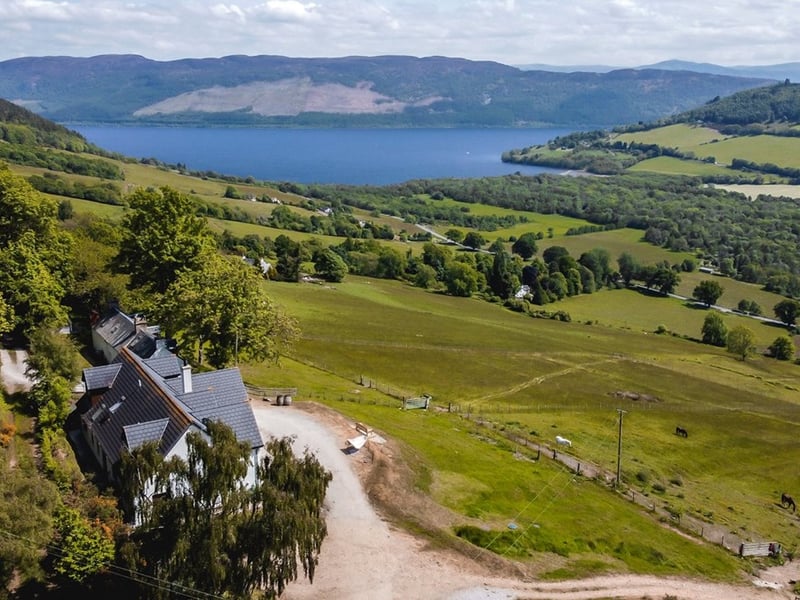 A five-bedroom house priced at offers over £750,000 alongside a three-bedroom cottage for offers over £310,00, available as a whole or in two lots through Galbraith.