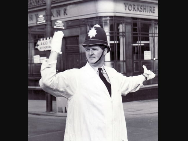 A Sheffield City Police Constable directing traffic in the city centre - 17th August 1961. Picture: Sheffield Newspapers