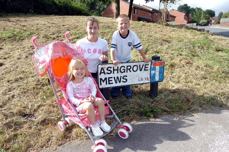 The YEP's Get It Sorted campaign helped get the grass cut for resdents of Ashgrove Mews in August 2007. Pictured are Leonora Campbell with her children Nicole and Sam.