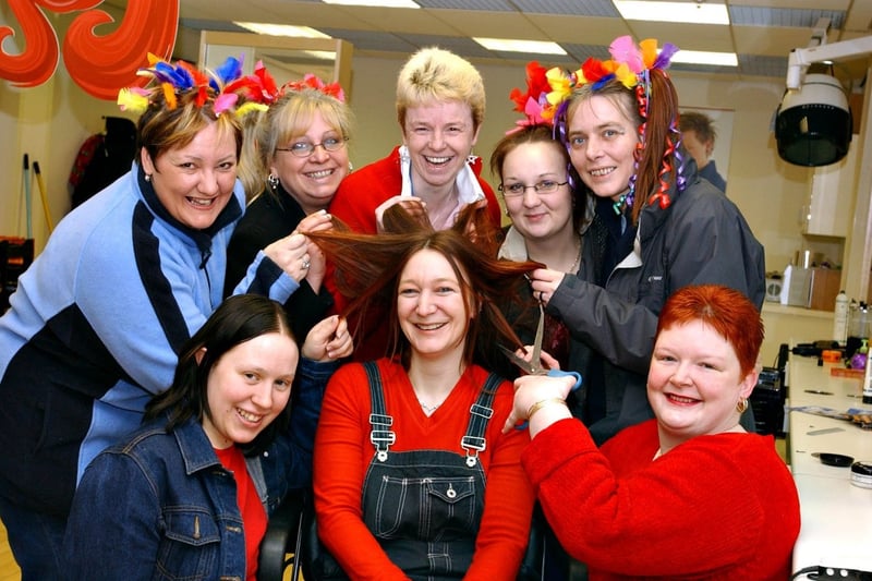 Kath Bone had her hair shaved off for charity in 2005.
Here she is with colleagues at the Bridge Project.
