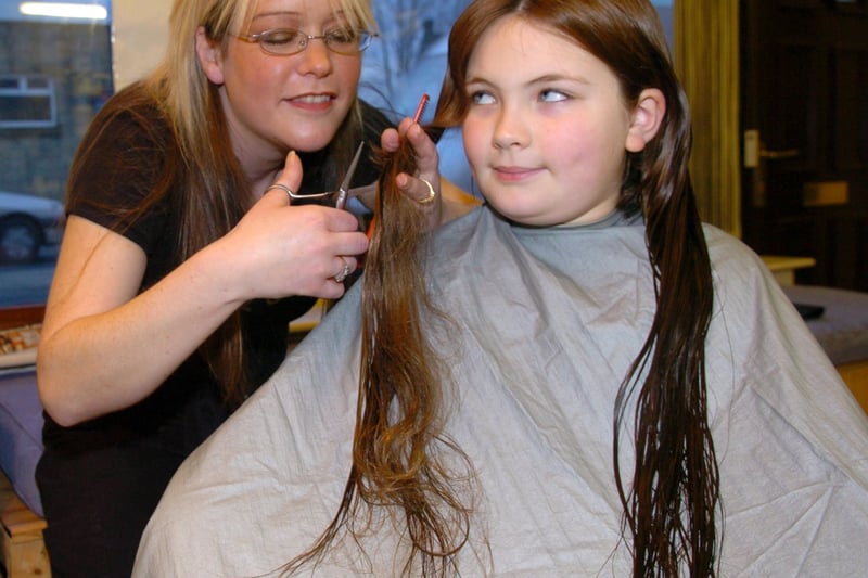 Briony Milner.with hairdresser Helen Whitworth at Rodley Barbers in January 2004. She was havi ng her hair cut to rasise money for victims of the Boxing Day Tsunami in south east asia.