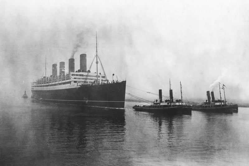 The Cunard ocean liner RMS Aquitania on the River Clyde, shortly after leaving the shipyard for her maiden voyage.