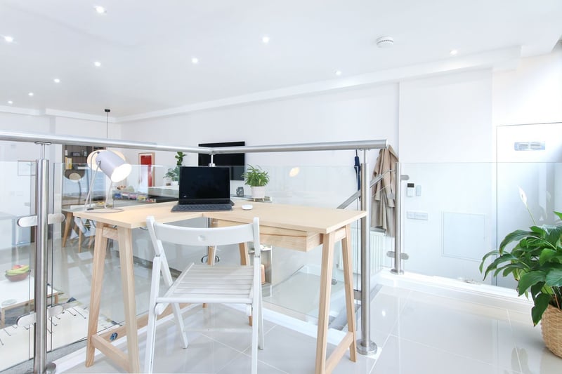 The feature split-level work-space in this modern shop conversion apartment. 