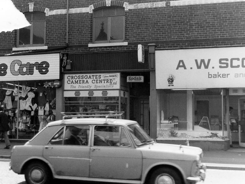 Part of a parade of shops on Austhorpe Road, showing from left, No.8 Kiddie Care children's centre, No.6 Crossgates camera centre and No.4 A.W.Scott, baker and confectioner. Pictured in June 1980.
