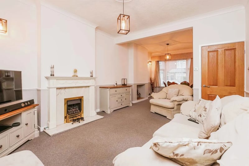 The cosy lounge has a double glazed bay window to the front, double glazed window to the rear with a living flame gas fire and two radiators, with a door to