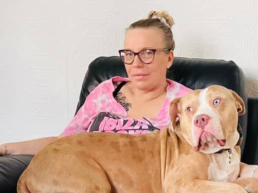 Janine Oxley, with her XL Bully Bruno. She says owners are now facing large costs as as a result of the ban on that type of dog. Picture: Janine Oxley