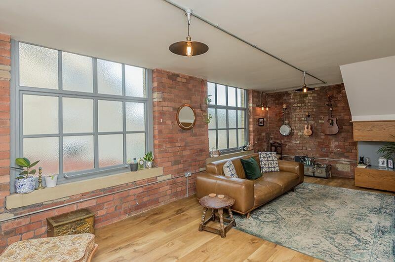 Exposed brick walls and industrial lighting continues the theme.