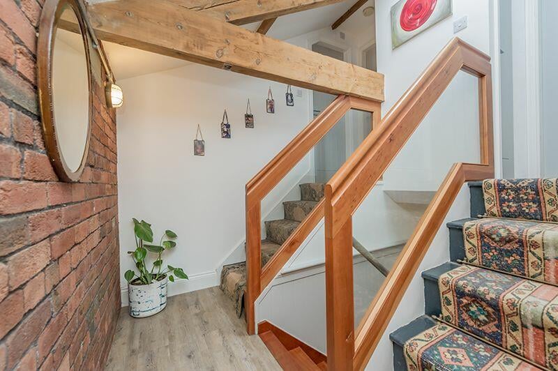 A gorgeous landing leads to the top floor.