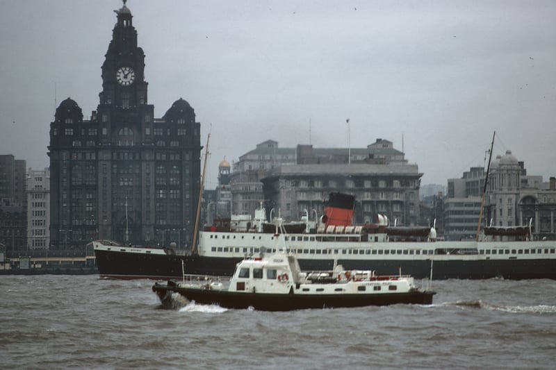 Boats on the River Mersey sail past the Royal Liver Building, Liverpool, November 1970. Image: RDImages/Epics/Getty Images