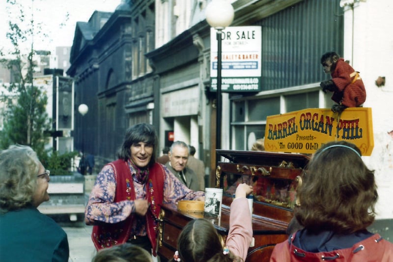 Barrel Organ Phil, with a monkey, on Bold Street, Liverpool, in 1975.