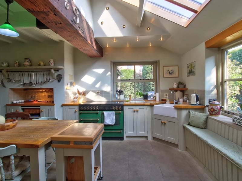 The charming home has a large, bright kitchen.