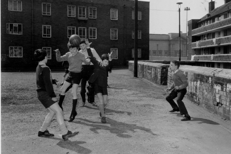 A group of children playing football in Juvenal Gardens, Liverpool.