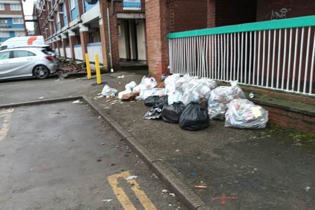 This spot on Club Garden Road used to be home to a communal bin shed that was not fit for purpose and infested with rats. The bins are gone now, but rubbish is still piled up here by residents who can't access the wheelie bins in the storage areas.