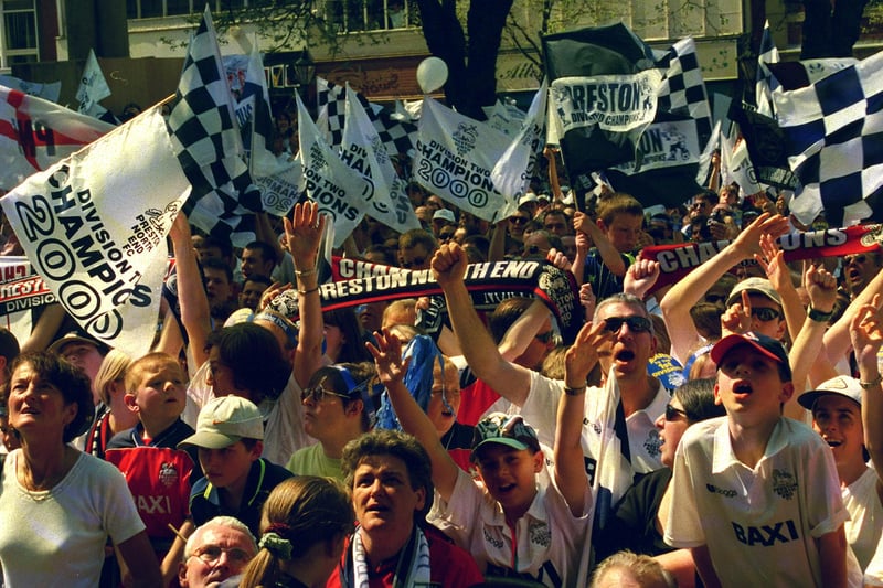 Preston North End supporters celebrate at the champions procession parade following their 1999-2000 Third Division title success