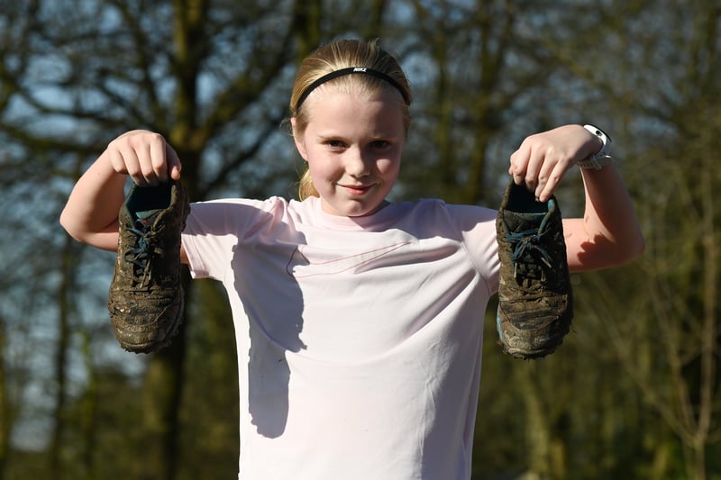 Ava Winstanley, 11, after finishing a muddy Parkrun.