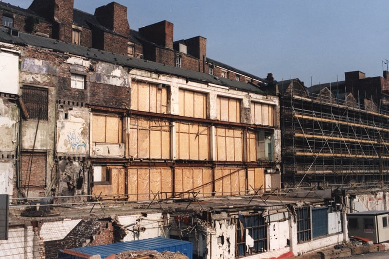 A view of the back of Market Street Newcastle upon Tyne taken in 1998. The photograph shows the rear of buildings on Market Street. Only the frontages of the buildings remain as the roof interior and the back walls were demolished. 