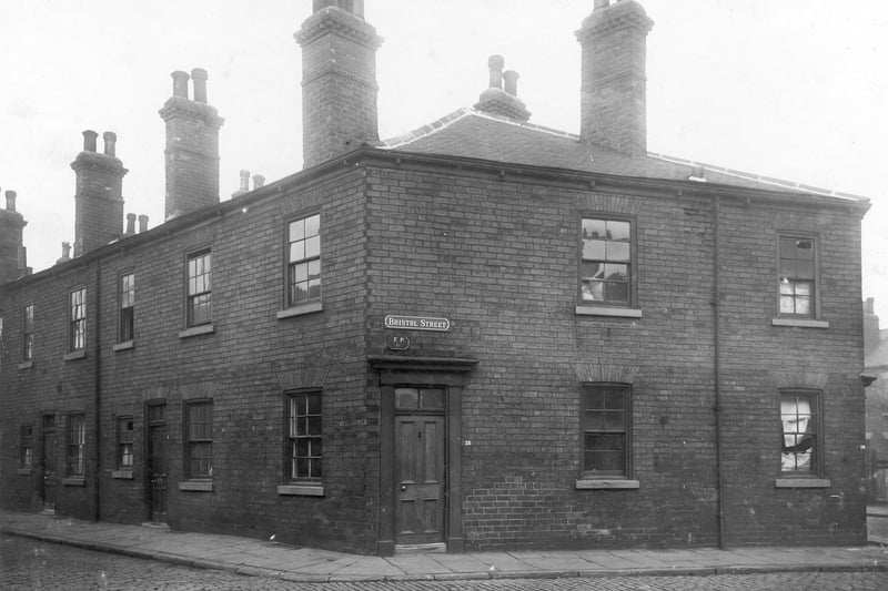 The corner of Bristol Street with Clifton Street, rows of two storey back to back terraced houses with chimney stacks. Pictured in October 1928.