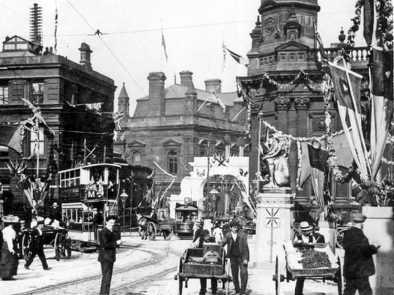 High Street and Fitzalan Square, in Sheffield, decorated for the royal visit of King Edward VII and Queen Alexandra in 1905, with the General Post Office and Haymarket visible