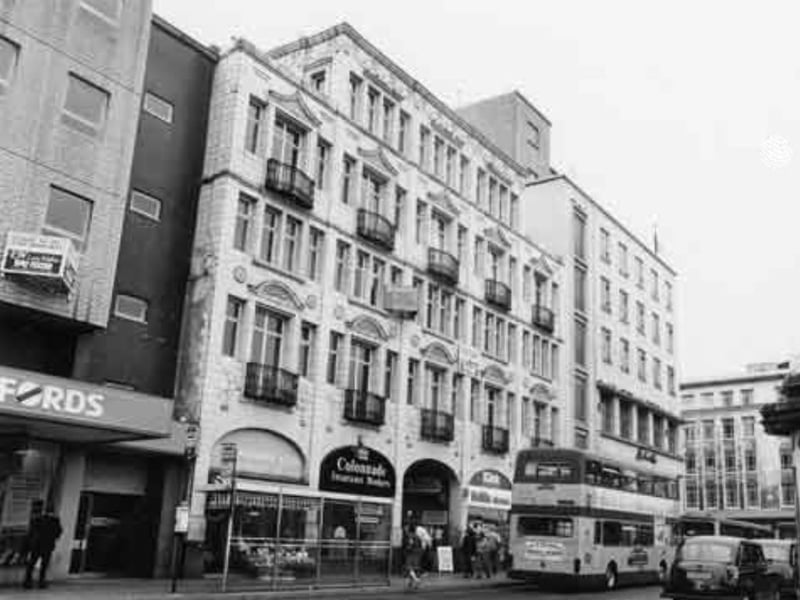 Fitzalan Square in 1992, showing shops J. W. Bradshaw and Son fruiterers Colonnade insurance brokers, Klick photopoint, and Smiths cleaners