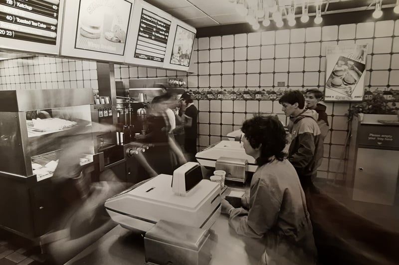 Wimpy in Blackpool 1985. The caption on the back says how eat, drink and be merry was taking on a new meaning in a modern world of high-speed cosumerism.