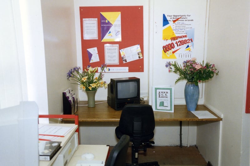 The Open For Learning Centre in an alcove of the Commercial and Technical Library on the ground floor of Leeds Central, seen at the time of the launch of this service in April 1994. The service provided materials in different formats, including computer disks and videos, for work related learning. Topics included GCSE examination woork, creative writing, computing and C.V. preparation. A 'Training Access Points' computer was also available with information on training courses.