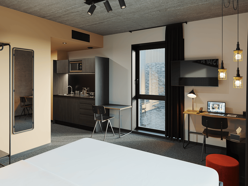 Another view of the extended stay studio at The Social Hub - with views out over the Merchant City.