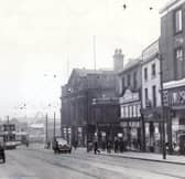 Haymarket, Sheffield, in 1955, showing Burton's Tailors, Lipton, Timpson's, Davy's Cafe and the Old No. 12