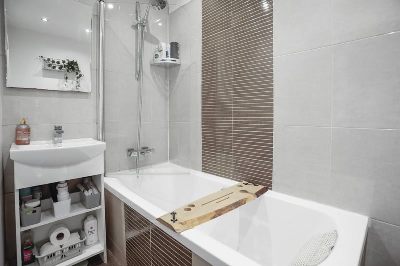 The Brunstane property's sleek and well presented bathroom with shower.