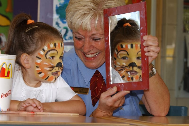 Kath O'Leary was bidding to break the world record for the most faces painted.
Here she is in 2003 at the McDonald's branch in Roker with 3-year-old Mollie Wilson.