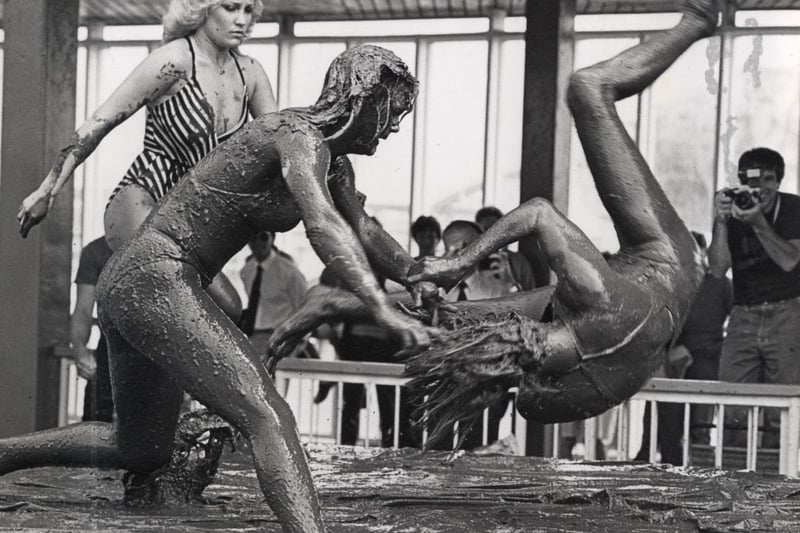 The Chicago Knockers female mud-wrestling team in action at Blackpool Pleasure Beach in 1984