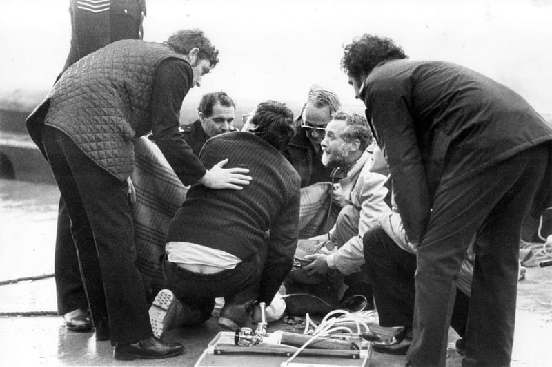 Rescuers working on a survivor of the drowning tragedy at North Shore in 1983