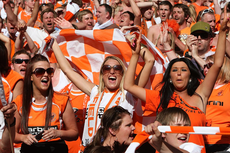 Blackpool fans celebrate the 3-2 win against Cardiff in the 2010 Championship play-off final