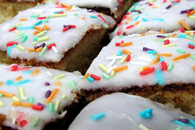 A nostalgic school-days treat, this classic sponge cake is adorned with rainbow sprinkles. The light and fluffy texture, combined with the vibrant colours, brings back memories of childhood birthdays and school celebrations.