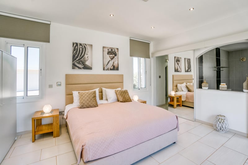 There are plenty of bedrooms to choose from at Peter Andre's Villa Amelia, including this very pretty one