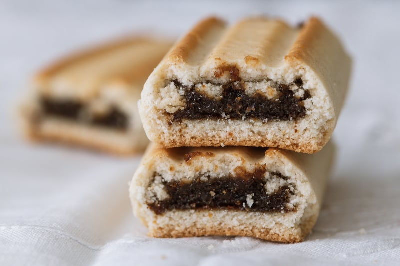 This sweet pastry  consist of a soft biscuit dough encasing a lightly spiced fig filling. The bite of fig-filled centres makes them perfect for a tea-time nibble. Whether enjoyed with a cup of tea or as a snack, fig rolls carry a sense of comfort and warmth, to many growing up in Birmingham. 