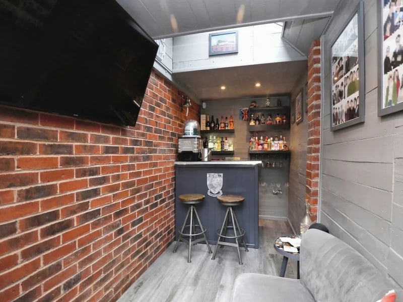 This cosy bar room is attached to the side of the house.