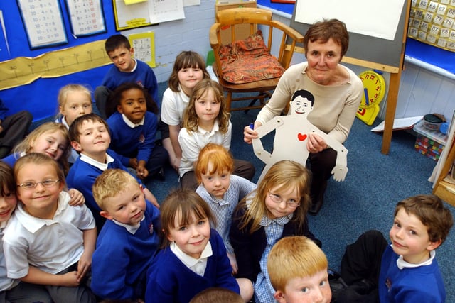 French teacher Maureen Bone is pictured with students at Westoe Infants 20 years ago. Remember this?