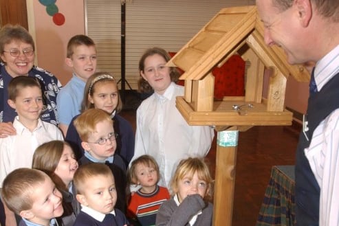 Paul Travis-Anderson from Dobbies Garden Centre was pictured showing the children of Barmston Primary School their new bird table in 2003.