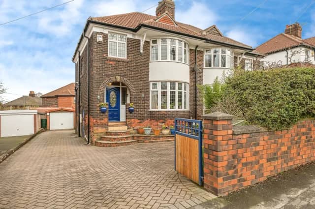 A colourful contemporary three bedroom family home on Uppermoor in Pudsey is for sale.