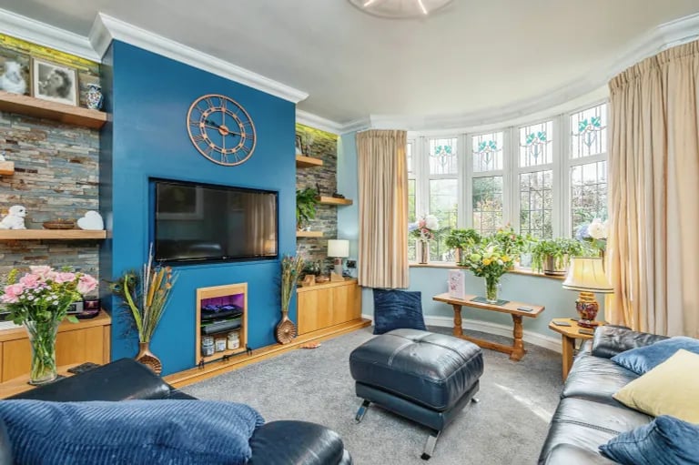 The spacious living room sits to the front of the home.
