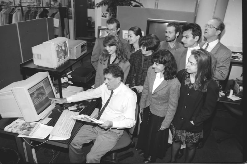 Picture operations manager Barrie Brayshaw shows the picture system at Yorkshire Post Newspapers to Bulgarian visitors in May 1994.